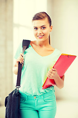 Image showing student girl with school bag and color folders