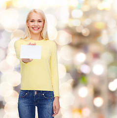Image showing smiling girl with blank business or name card