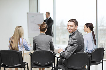 Image showing businessman with team in office