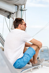 Image showing man sitting on yacht deck