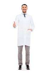 Image showing smiling male doctor showing thumbs up