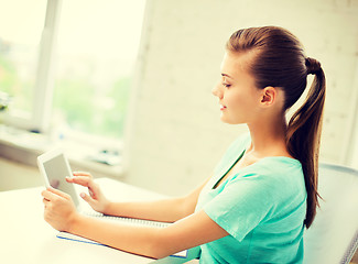 Image showing attractive student girl using tablet pc