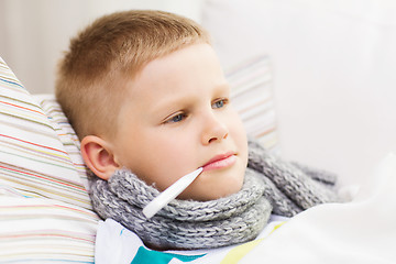 Image showing ill boy with flu at home