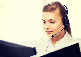 Image showing friendly female helpline operator