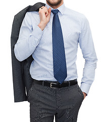 Image showing handsome buisnessman with jacket over shoulder