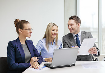 Image showing business team with laptop having discussion