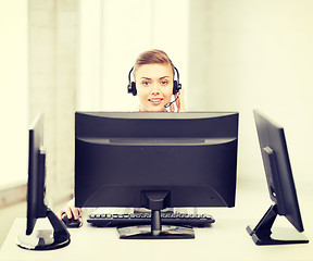 Image showing friendly female helpline operator