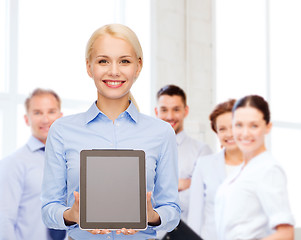 Image showing businesswoman with blank black tablet pc screen