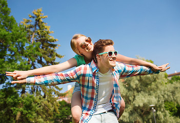 Image showing smiling couple having fun in park