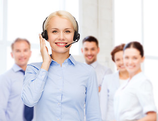 Image showing friendly female helpline operator