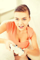 Image showing woman with joystick playing video games