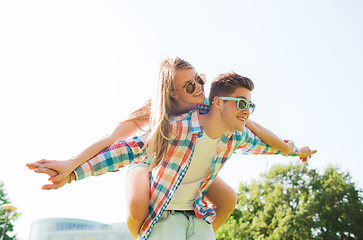 Image showing smiling couple having fun in park