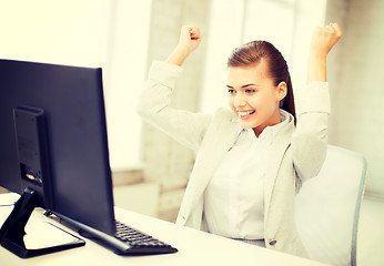 Image showing businesswoman with computer in office