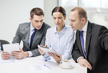 Image showing business team with tablet pc having discussion