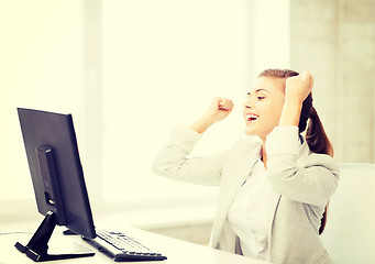 Image showing businesswoman with computer in office