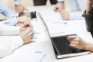 Image showing close up of files and laptop computer in office