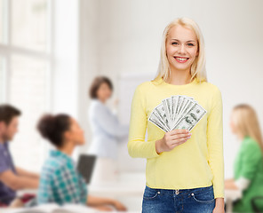 Image showing smiling girl with dollar cash money