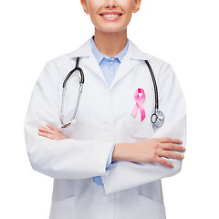 Image showing female doctor with breast cancer awareness ribbon