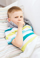 Image showing ill boy with flu at home