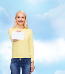 Image showing smiling girl with blank business or name card