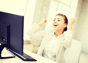 Image showing businesswoman with computer in office