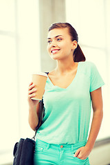 Image showing student holding take away coffee cup