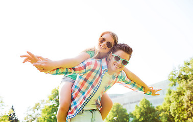 Image showing smiling couple having fun in park