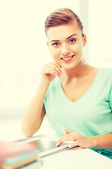 Image showing smiling student girl with tablet pc