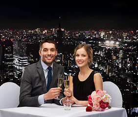 Image showing couple with glasses of champagne at restaurant