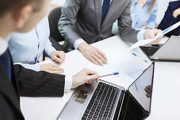 Image showing close up of files and laptop computer in office