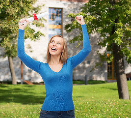 Image showing smiling woman with diploma