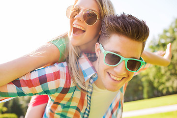 Image showing smiling couple having fun in park