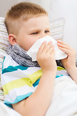 Image showing ill boy with flu at home