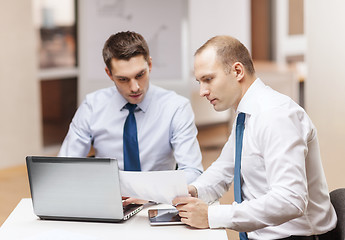 Image showing two businessmen having discussion in office