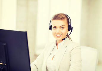 Image showing friendly female helpline operator