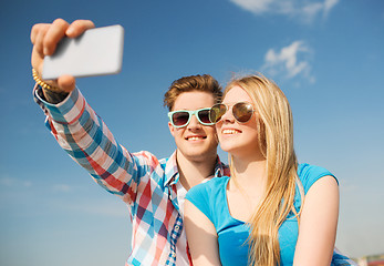 Image showing smiling couple having fun outdoors