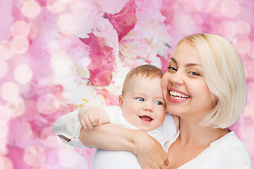 Image showing happy mother with smiling baby