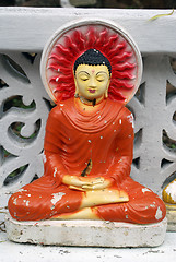 Image showing Red Buddah under the tree