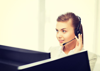 Image showing friendly female helpline operator
