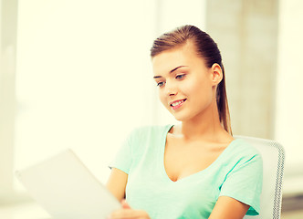 Image showing smiling student girl with tablet pc