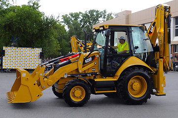 Image showing City Day of Tyumen, on July 26, 2014, show of dancing excavators