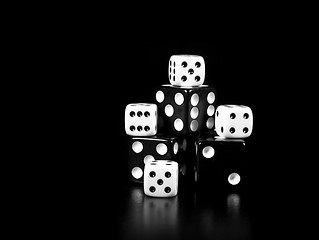 Image showing Black And White Dice On Black Background