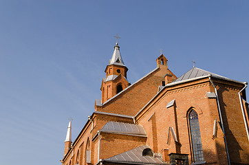 Image showing gothic church tower crosses on blue sky background 