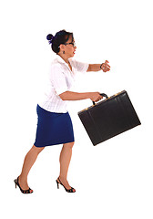 Image showing Business woman running late.