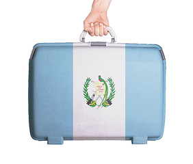 Image showing Used plastic suitcase with stains and scratches