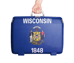 Image showing Used plastic suitcase with stains and scratches