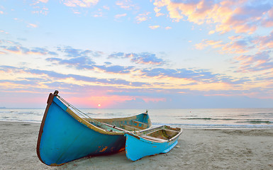 Image showing Fishing boats and sunrise 