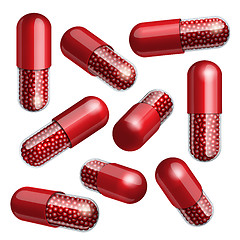 Image showing Medical red capsule with granules