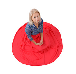 Image showing The beautiful blonde in a red skirt