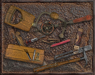 Image showing vintage woodworking tools over rusty plate